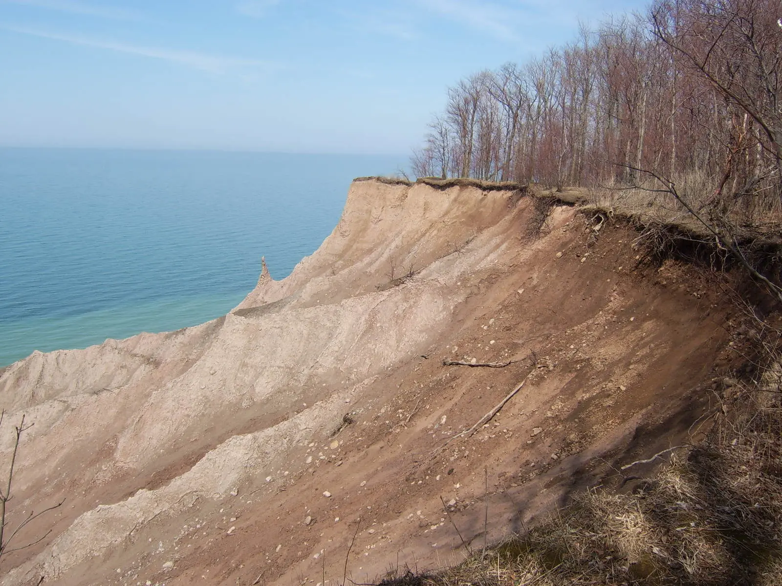 The eroded clay spires of Chimney Bluffs rising above Lake Ontario