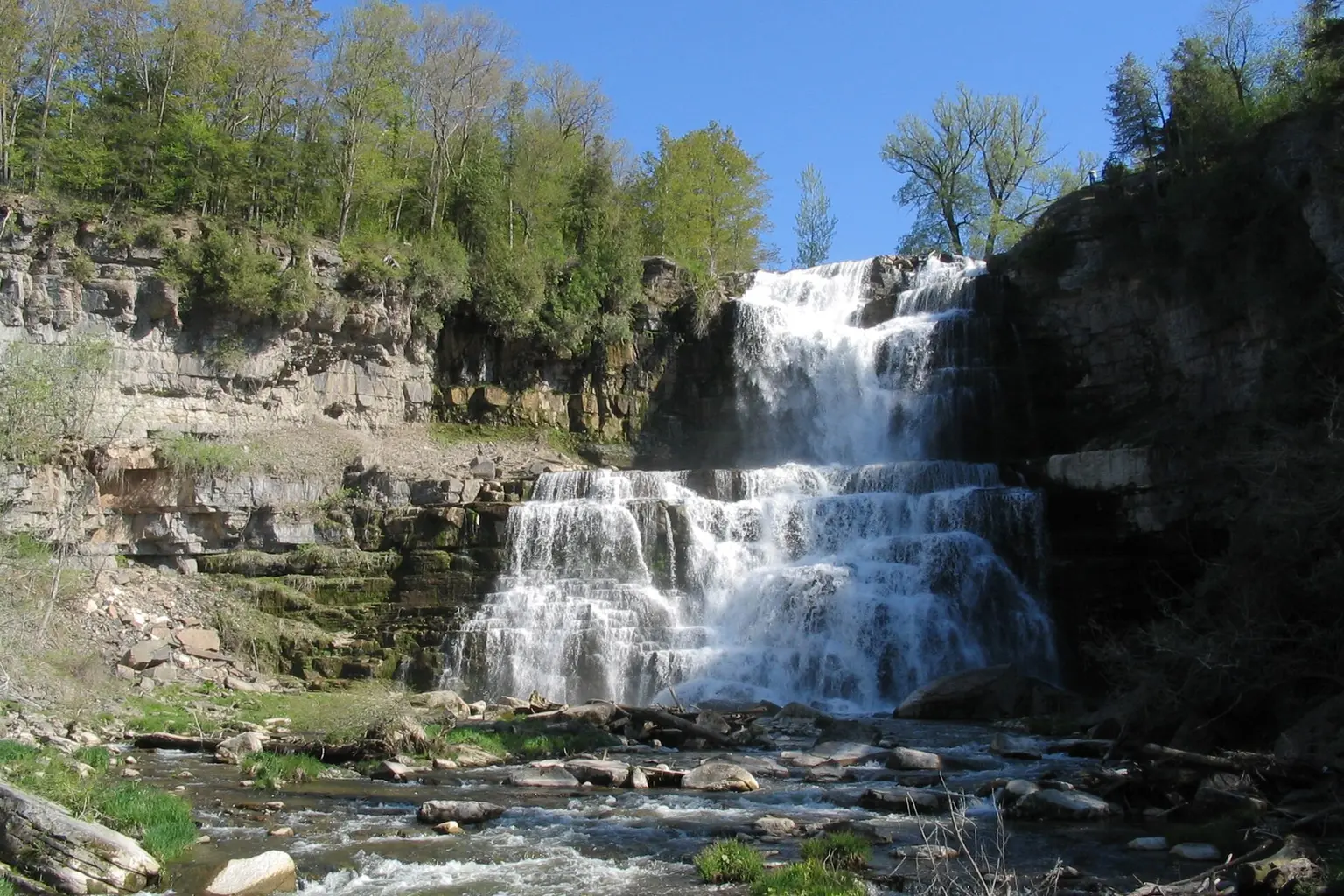 Chittenango Falls cascading over layered rock inside Chittenango Falls State Park